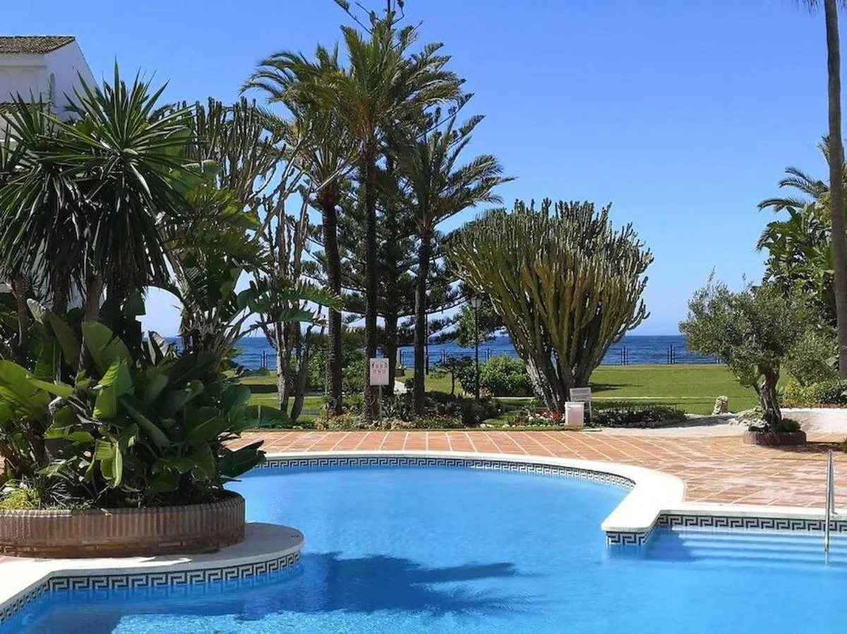 Image 1 of Modern apartment with pool on the beachfront in Marbella by SharingCo