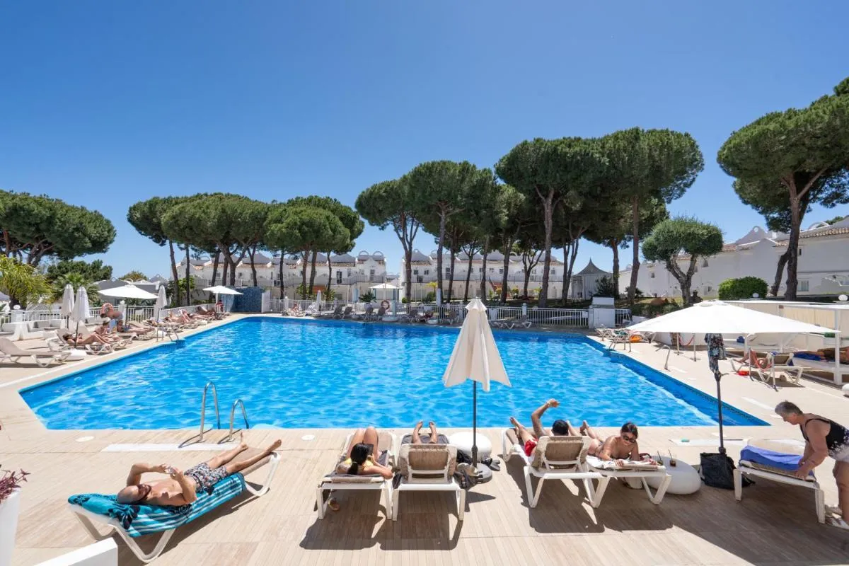 Image 1 of Sunny 2BR in resort with 3 pools, restaurant, gym and playground