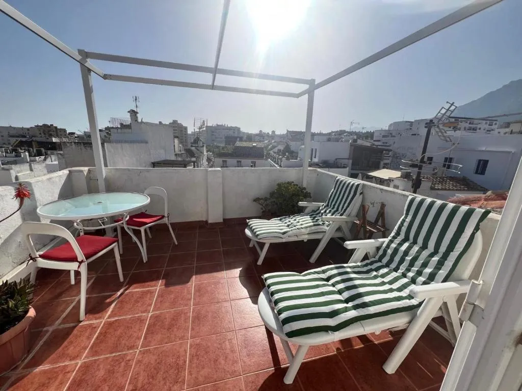 Image of old town house with roof terrace